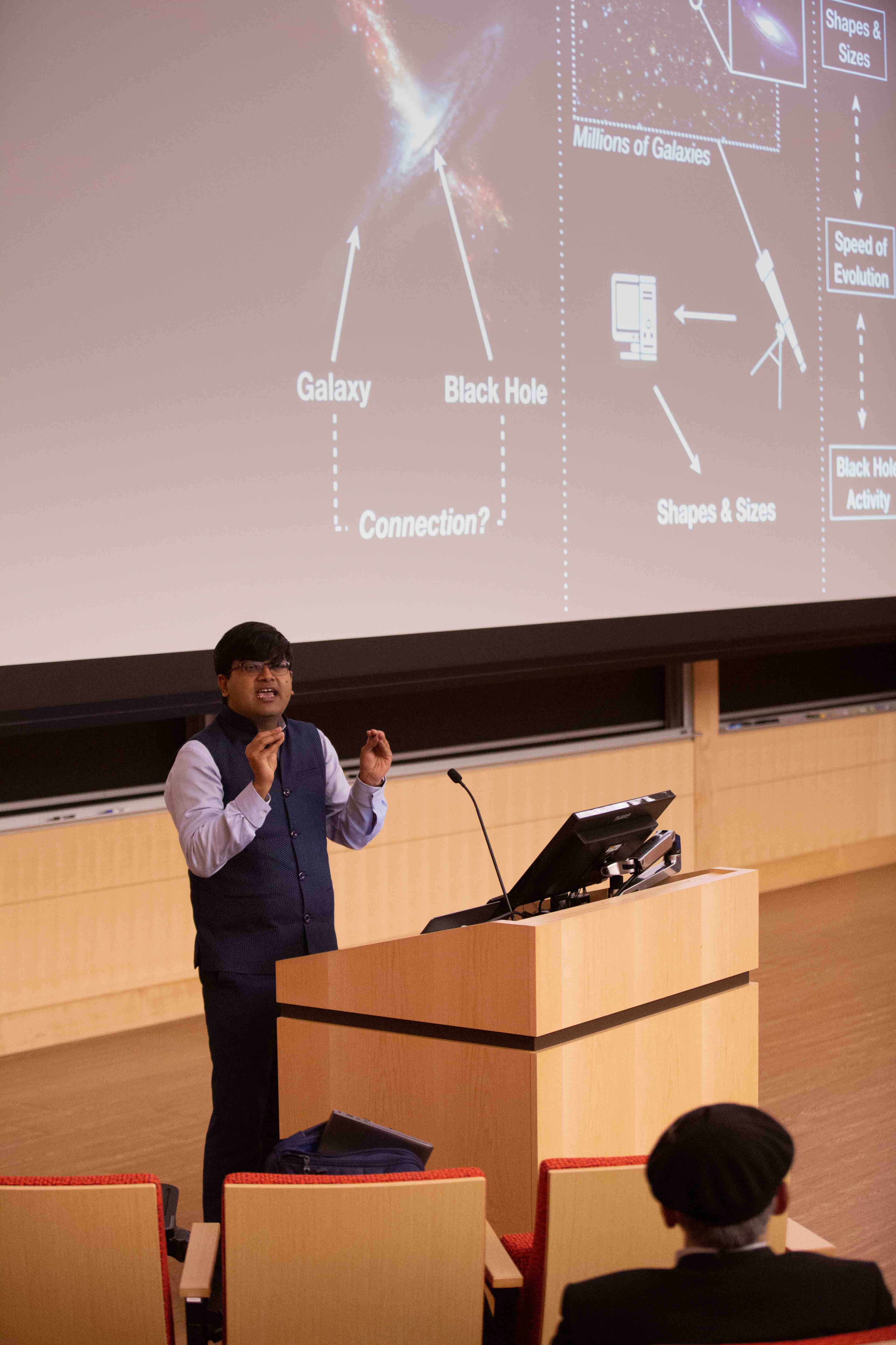 Aritra Ghosh delivering a public lecture